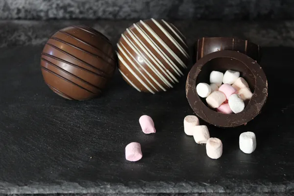 Boozy Flavoured Hot Chocolate Bombes with Mini Marshmallows